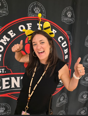 teacher with bee headband