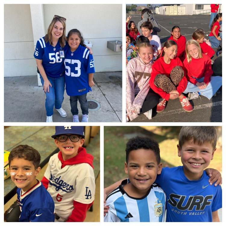 kids smiling wearing sports jerseys 