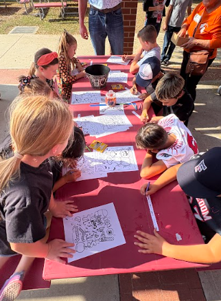 students doing an activity at a table
