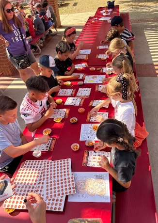 students doing an activity at a table
