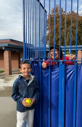 student by a dunk tank