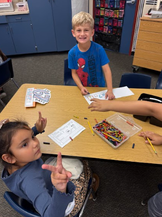 students working on a book