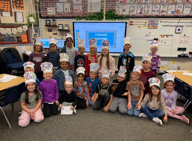 students wearing  67 hats