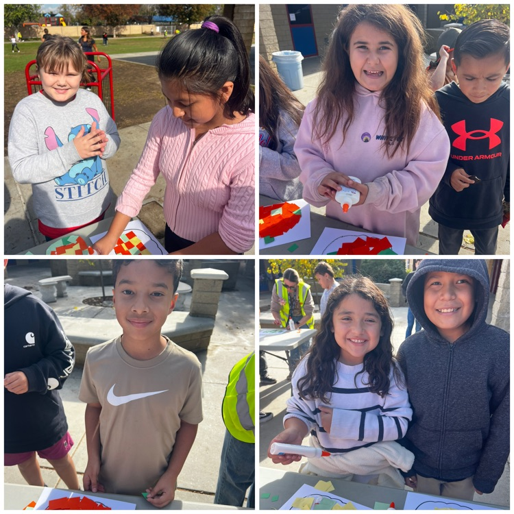 girls and boys smiling at the camera