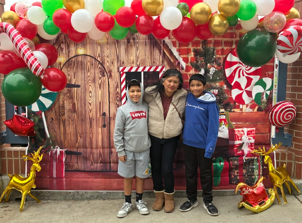 family with Christmas background