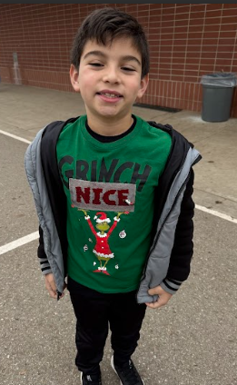 student dressed in red and green