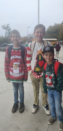 students in Christmas sweaters