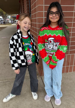 students in Christmas sweaters