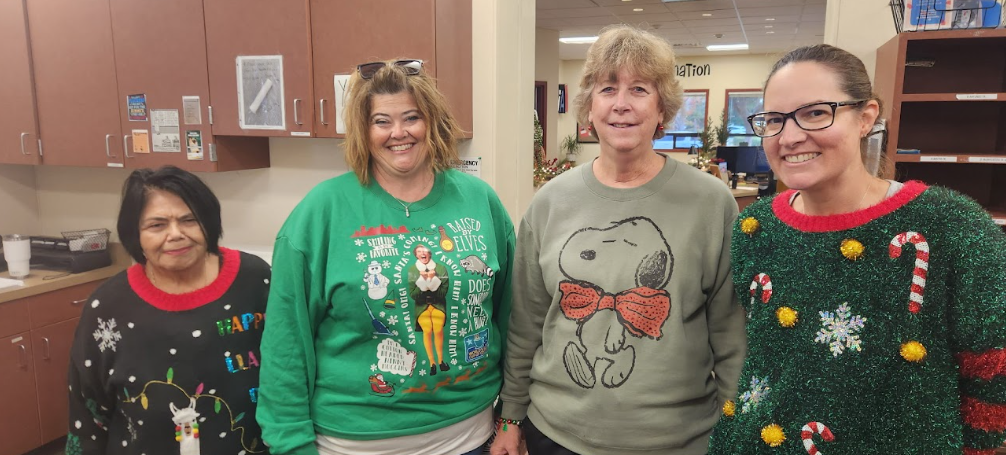 Teachers in Christmas sweaters