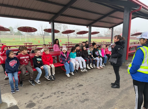 students outside with teacher