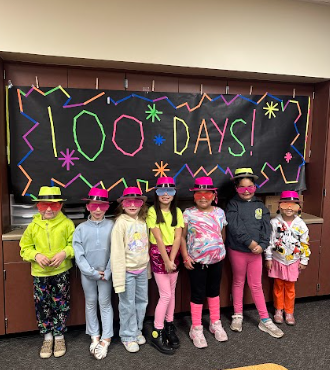 students wearing Glow in the dark hats and sunglasses