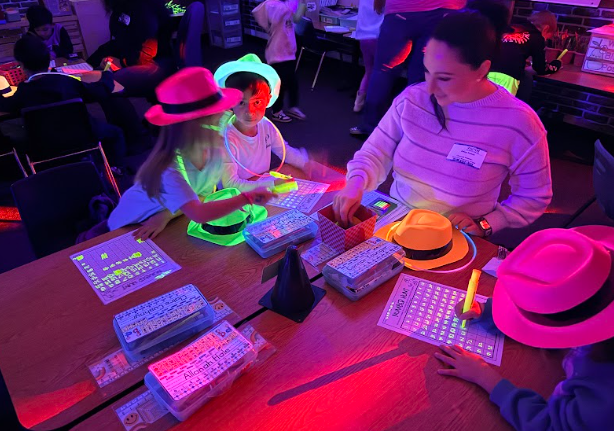 students working with Glow in the dark paper
