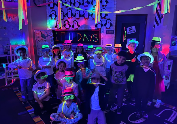 student working with Glow in the dark paper