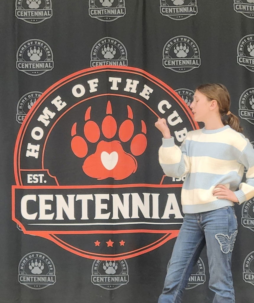 student  performing on stage