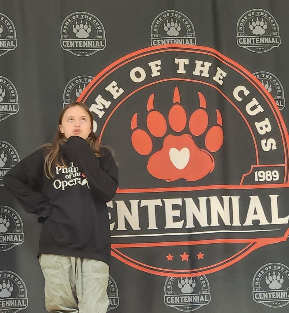 student  performing on stage