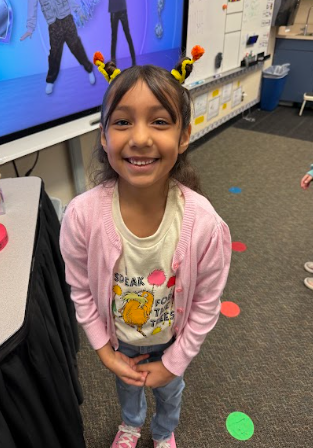 Student dressed up with Lorax trees