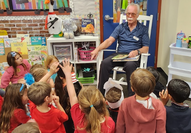 Celebrity reader reading to students