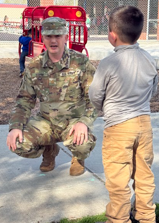 soldier with student