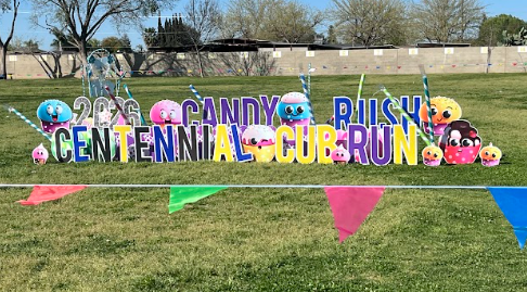 sign that reads 2026 candy rush centennial Cub run