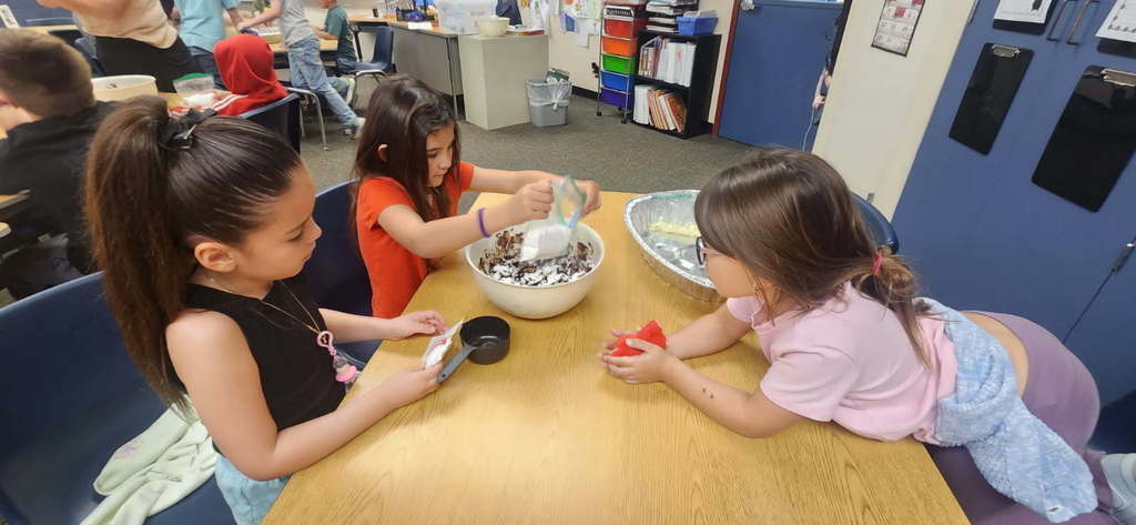 students working on a recipie