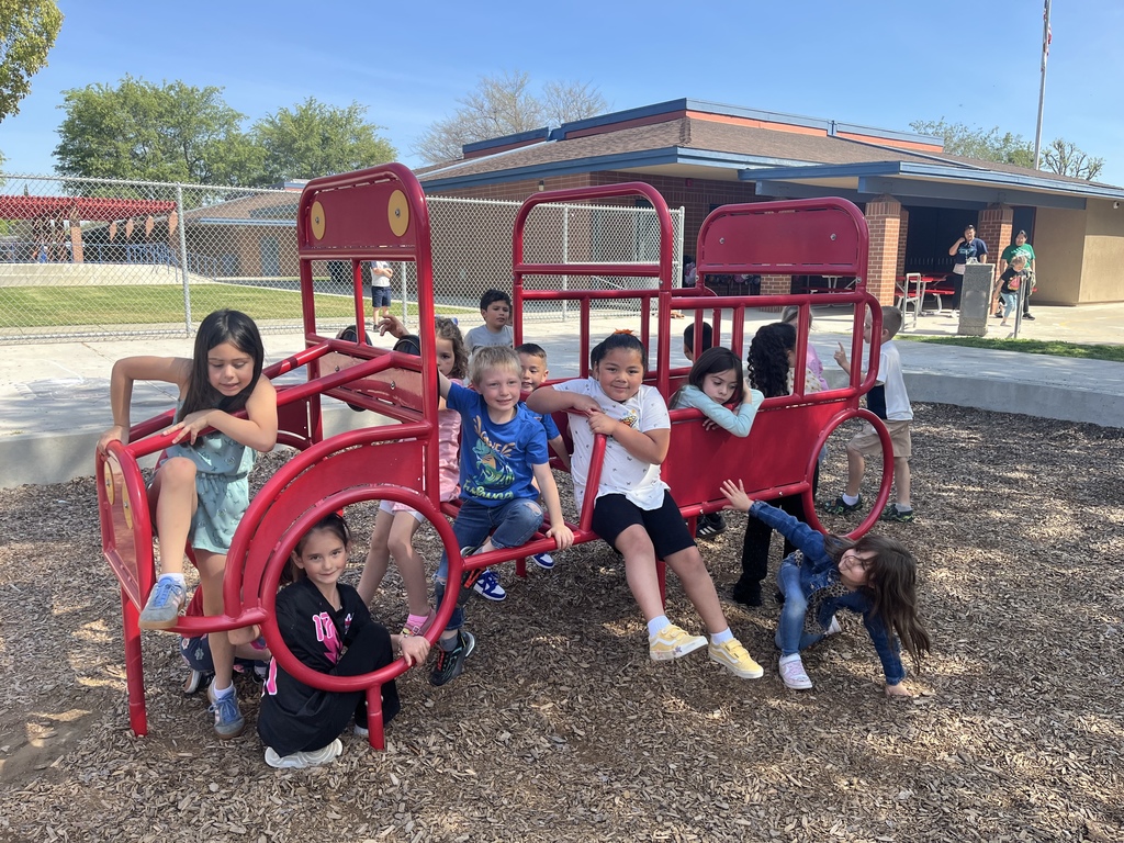 students with clovers on a fire truck