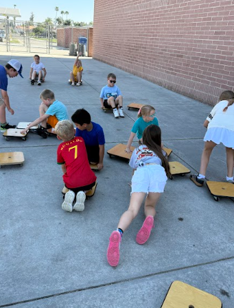 students on scooters