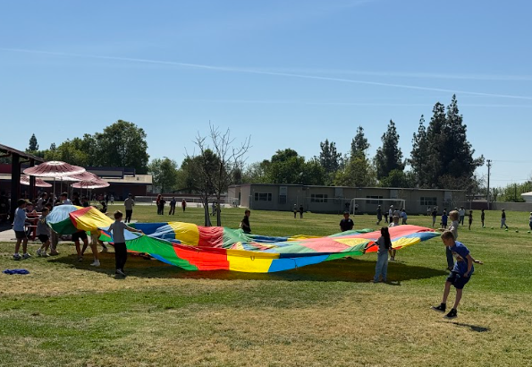 students with a parachute