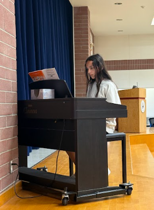 students playing the piano