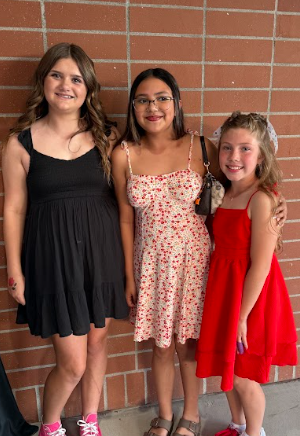 girls dressed up for the dance