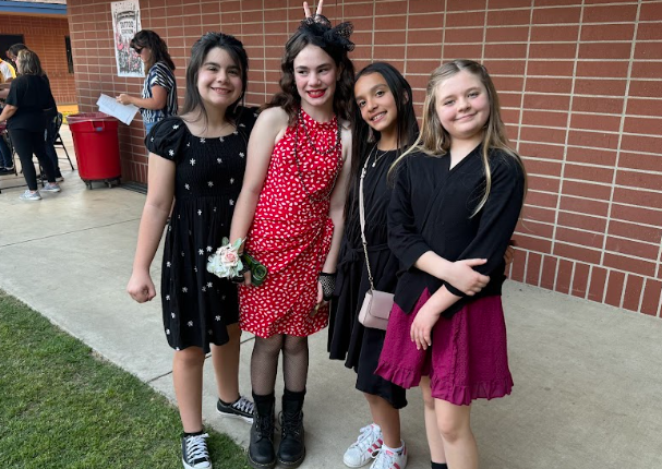 girls dressed up for the dance