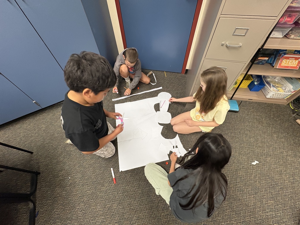 students with building materials 