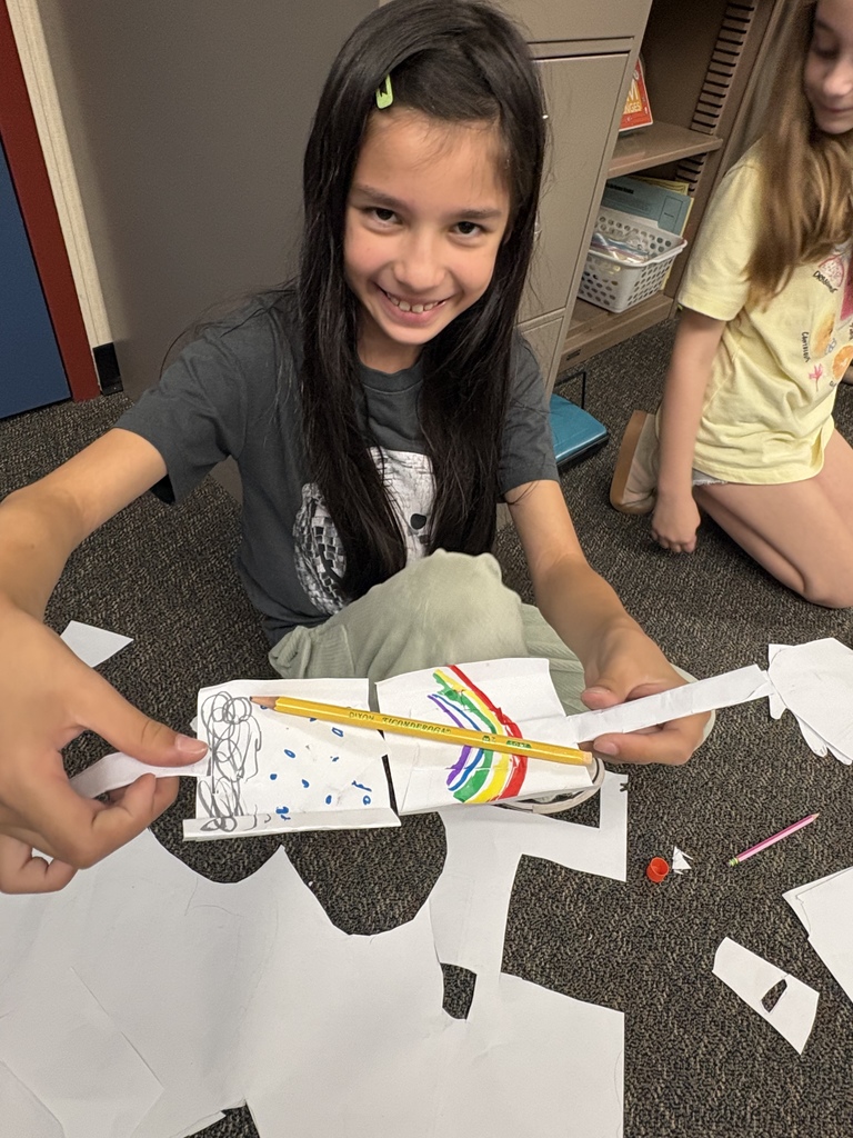 student with building materials 