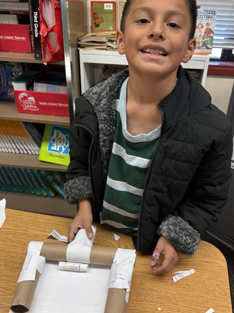 student with building materials 