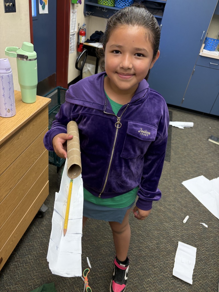 student with building materials 