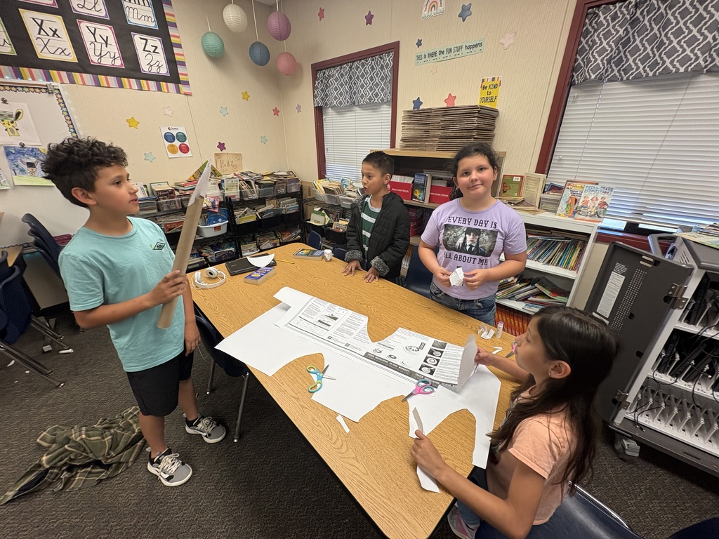 students with building materials 