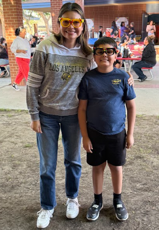mother and son with Lego glasses