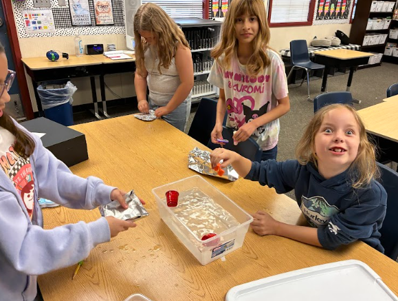 students with ice experiment