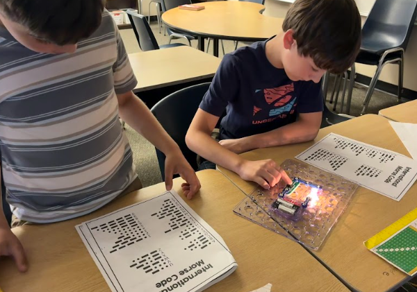 students with circuit boards