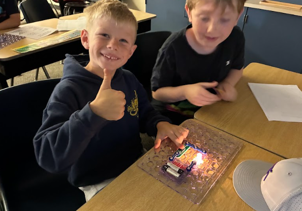 students with circuit boards