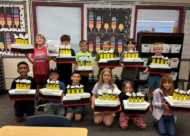 students with their  models of the Titanic