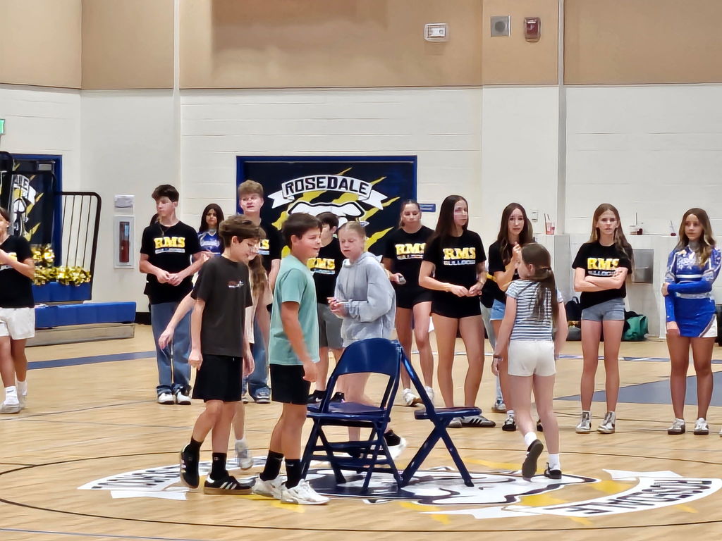 students on a gym floor