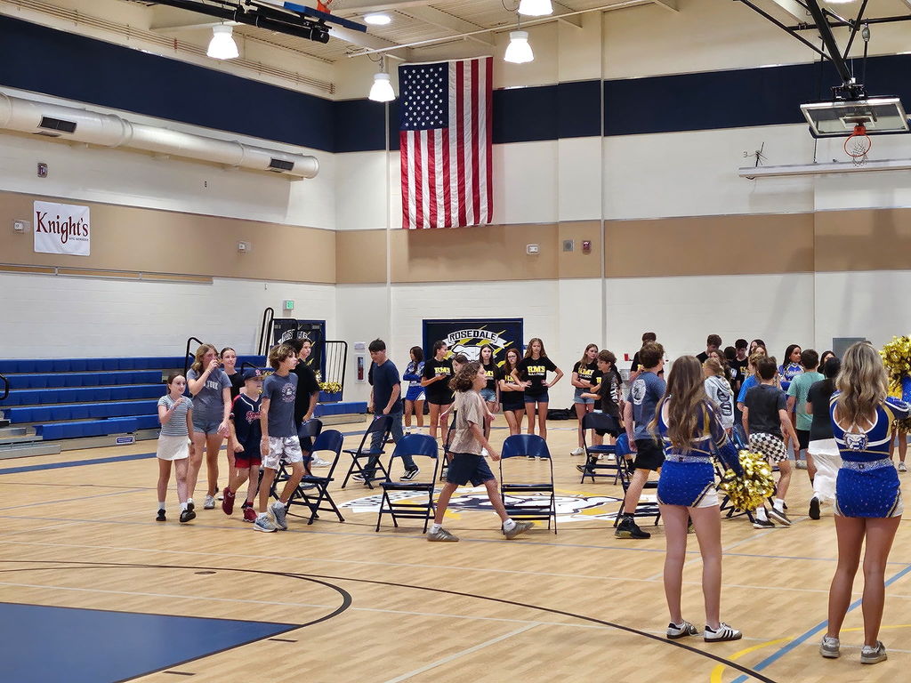 students playing a game in a gym