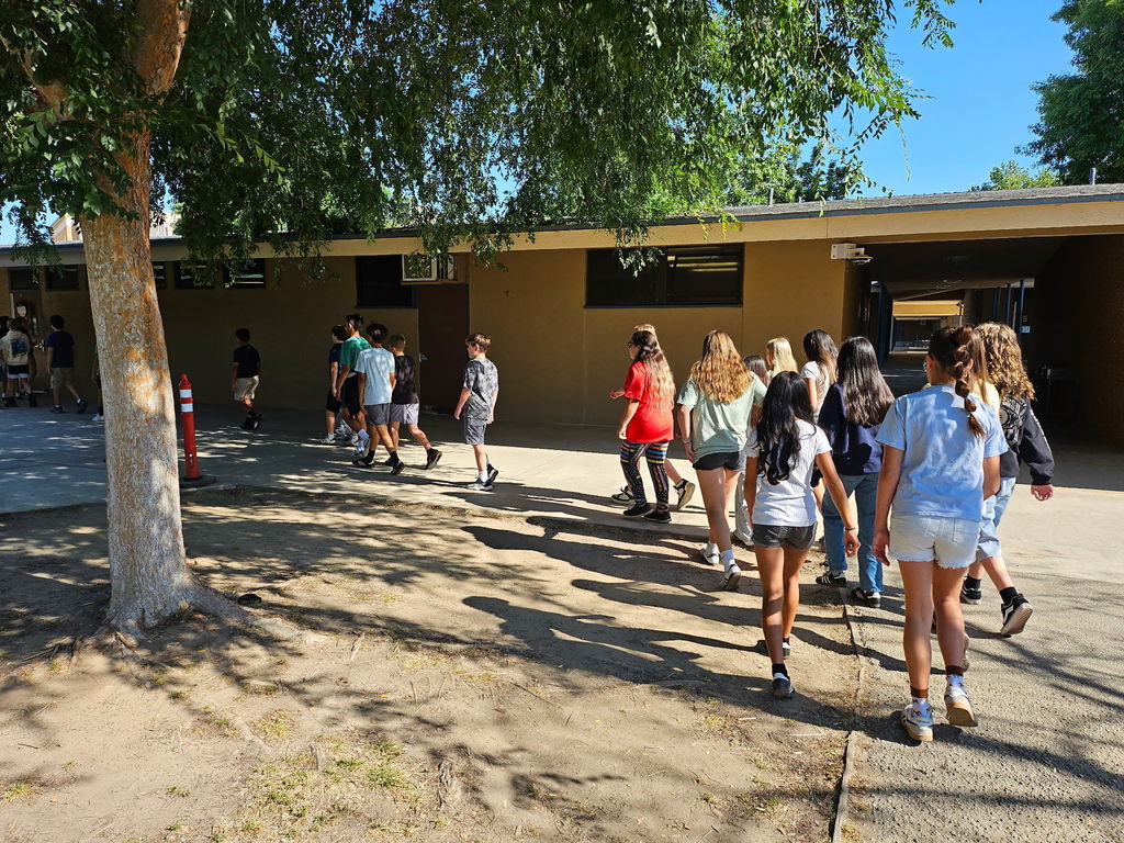 students walking around a school
