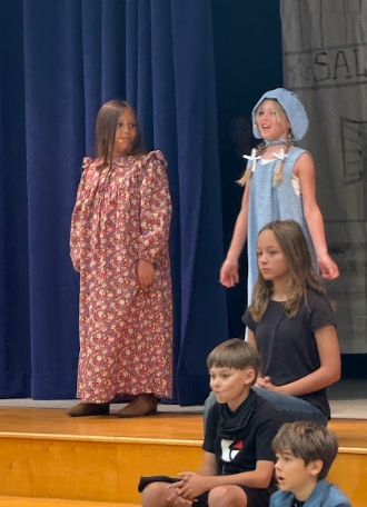 students on a stage