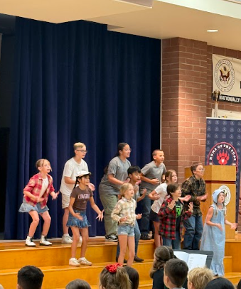 students on a stage
