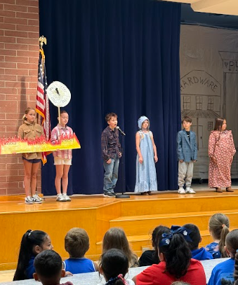 students on a stage