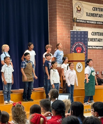 students on a stage