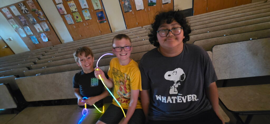 boys with glow sticks