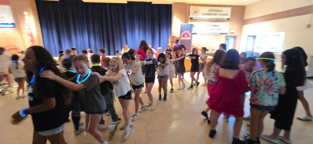 students doing a conga line