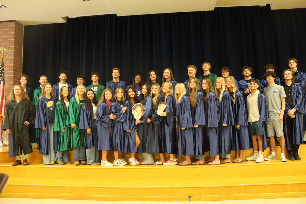 students in graduation gowns